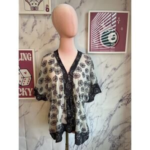 Johnny Heaven Womens sheer v neck blouse sz M0